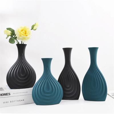 China Mediterranean Personalized Modern Home Decor Hotel Restaurant Office Flower Shelf Vases Decorative Ceramic Black Green Tabletop Filler Vase for sale