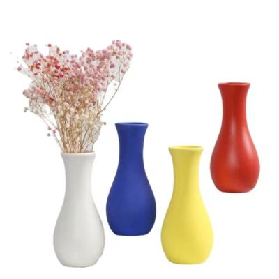 China Modern Minimalist Decorative Blue Red Yellow White Ceramic Vase Table Shelf Flower Vase Filler Container Home Office Decor for sale