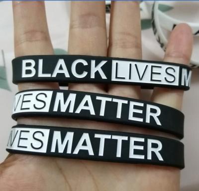 China Europe Debossed Hot Selling Cheap Sport Filled Black Lives Matter Silicone Rubber Wristbands for sale