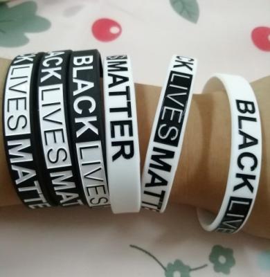 China Europe Lives Dark Matter Debossed Filled Silicone Rubber Wristband Ready To Ship for sale