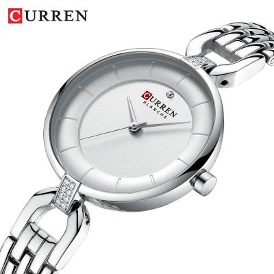 China CURREN 9052 women fashion watch luxury 3 pointer simple wristwatch quartz stainless steel strap black watch female for sale