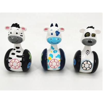 China Wholesale Zebra Baby Toys Slide And Shake Chubby Rocker Toy With Light And Music for sale