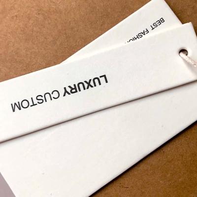 China Custom Recyled Apparel String Label Jewelry Stickers Plastic Label Tag for sale