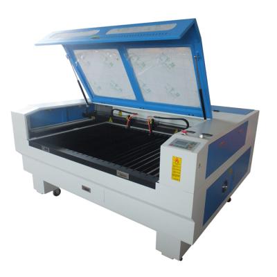 China High Resolution 1390 Laser Engraving Granite Stone Laser Cutting And Engraving Machinery for sale