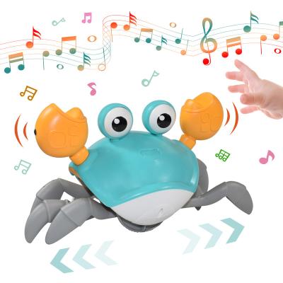 China ABS Plastic Summer Induction Outdoor Crab Toys Rechargeable Electric Walking Crab Music With LED Light Crab Crawling Toy For Kids for sale