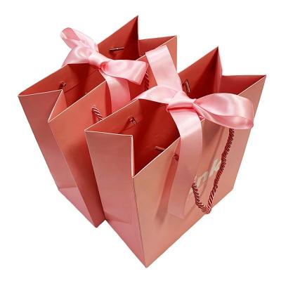 China Wholesale Custom Fashion Recyclable Clothes Shopping Gift Packaging Paper Bag With Handle for sale