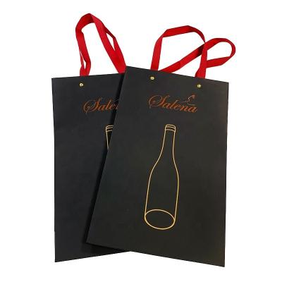 China Recycled Materials Wholesale Custom Printed Black Luxury Shopping Paper Gift Bag With Handle for sale