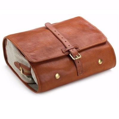 China Durable Personalized Leather Roll Up Hanging Toiletry Bag Leather Dopp Kit for sale