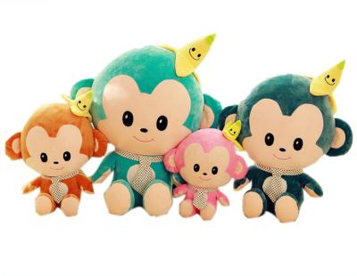 China Custom Plush Factory Logo Soft Plush Stuffed Monkey Toy With Banana Hat For Baby Kids Gift for sale