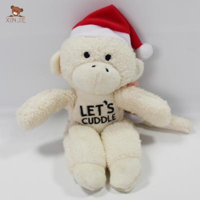 China Plush OEM Stuffed Monkey Plush Toy With Logo And Christmas Hat for sale