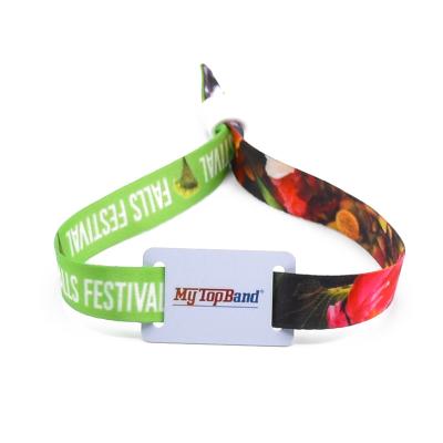 China Custom Logo 13.56MHz Waterproof / Waterproof NFC RFID Festival Wristband For Cashless Payment for sale