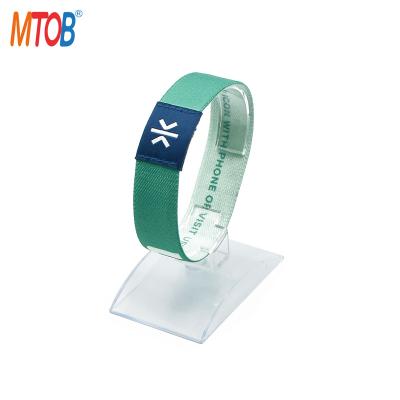 China Custom Elastic Cloth Wristband RFID NFC Stretch Wristband New Design Waterproof/Waterproof For Theme Park for sale