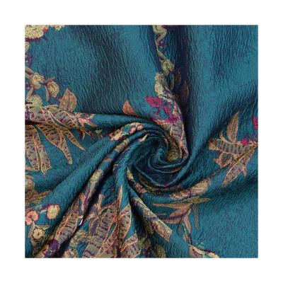 China Heat-Insulation 100% Polyester Floral Textiles Big Flower Crepe Jacquard Fabric For Women Dress for sale