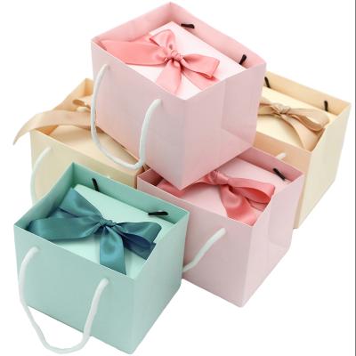 China Recyclable Luxury Custom Perfume Macaroon Color Small Gift Box Packaging Candy Box With Ribbon for sale