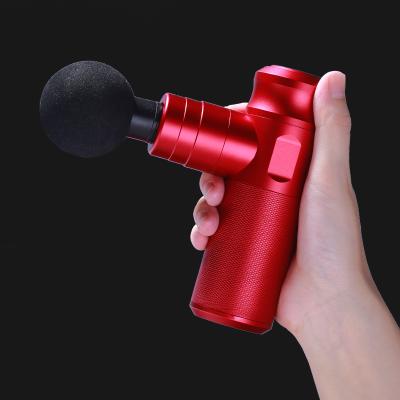 China AOPUQI New Convenient Mini Body Vibration Massage Gun Held Massage Magic Gun for sale