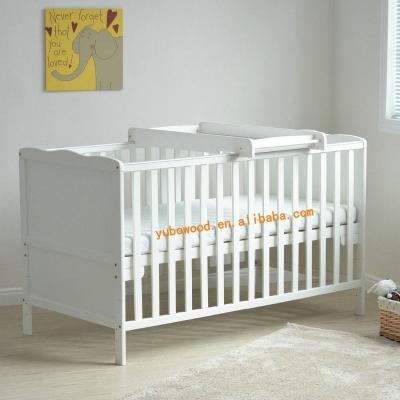 China Solid wood baby cradle bed with changing table for sale