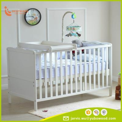 China Solid Wood Baby Bassinet with Switch Baby Changing Table for sale