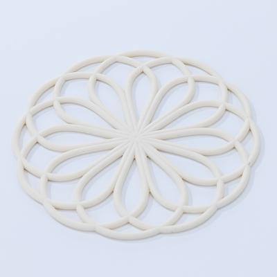 China Viable Hot Sale Silicone Flower Shape Mat Silicone Kitchen Utensil Heat Resistant Coaster for sale