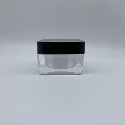 China Non Spill New Round 50g Square Acrylic Double Wall Clear Face Cream Cosmetic Packing Jar With Black Top for sale