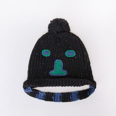 China Retro Dark Funny Handmade Wool Striped Face Hat Warm Hat Knitted Autumn And Winter Men And Women Couple for sale