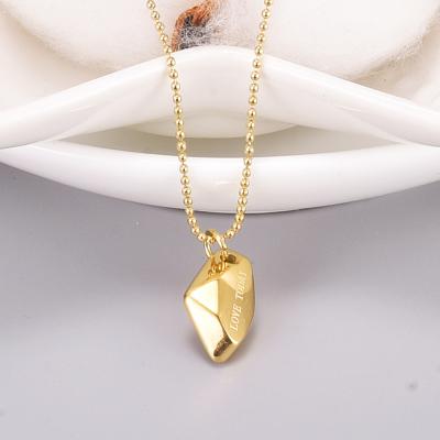 China Latest Design TRENDY 18k Gold PVD Plated Letter Engraved Stainless Steel Pendant Necklace Irregular Stone Shape Pendant Necklace for sale