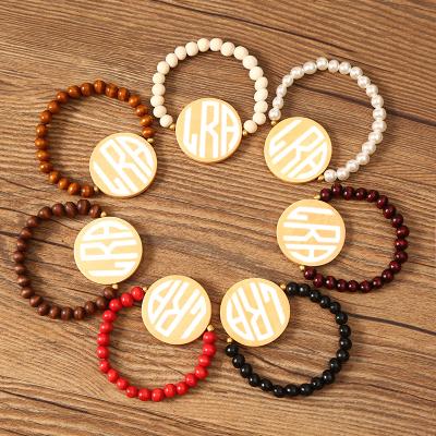 China Personalized Handmade Blank Wooden Monogram TRENDY Logo Wooden Beads Custom Moq 100 Pcs Disc Bangle Bracelet for sale