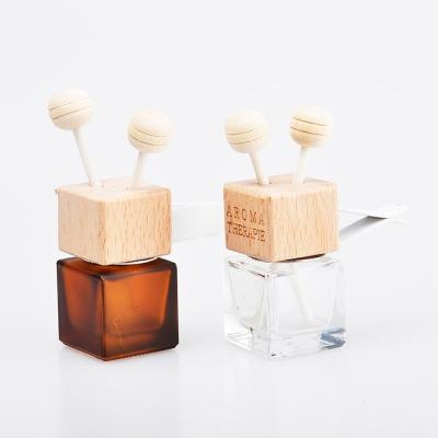 China 8ml Personal Care Car Air Conditioner Air Conditioner Vent Hose Clip Perfume Car Air Freshener Empty Square Bottle With Wooden Cap for sale