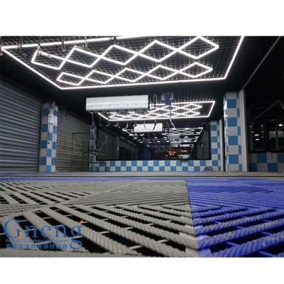 China DIY Assembling Lights Good Quality Linear Aluminum Housing Seamless Connection Led Hexagon Honeycomb Lights Garage Detailing Light for sale