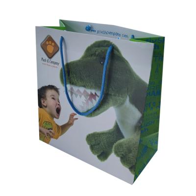 China Recycled Materials STPP Developed Art Paper Plush Kids Gift Paper Bag For Toys Easy Handling Paper Bag for sale