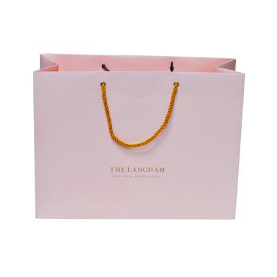 China Logo Design Luxury Paper Bag Recyclable Customized Gift Packaging Bag Shopping Paper Bag With Ribbon Handle for sale