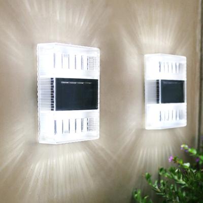 China Outdoor LED Garden Lights Garden Solar Powered Waterproof Wall Lamp for Fence Deck Stair Lights Decoration for sale