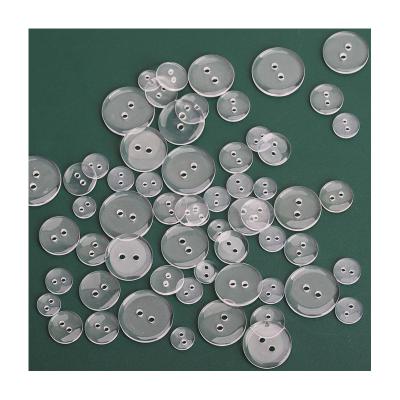 China Yiwu Viable Factory Transparent White Shirt Buttons Round The Two Hole Resin Plastic Buttons For Clothes for sale