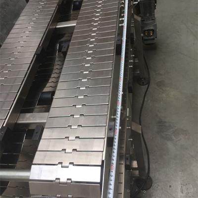 China Oil Heavy Duty Table Top Chain Conveyor And Slat Top Chain Conveyor for sale