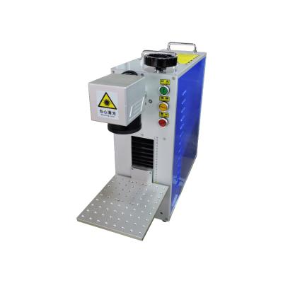 China High Quality Laser CO2 Flight Laser Marking Marking Machine For Engraving Metal And Nonmetal for sale