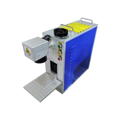 China Laser Fiber Jeans Laser Marking Engraving Machine With Metal And Nonmetal Marking for sale