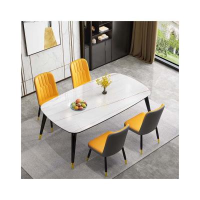 China Modern simple modern glass dining table rock panel dining table and chair combination for sale