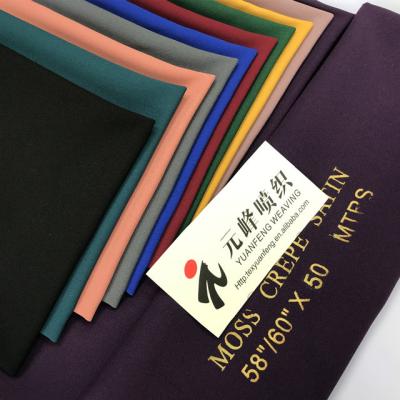 China WHOLESALE CHEAP PRICE POLYESTER FOAM CREPE SATIN FABRIC ANTI-STATIC FABRIC STOCK LOTS FOR GARMENT for sale