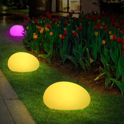 China Lâmpada solar de jardim de pedra exterior Plug de solo Luzes solares LED coloridas à venda