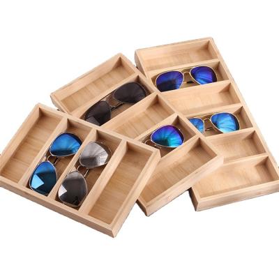 China Durable 2022 Storage Display Glasses Props Three Height Wooden Glasses Tray Sunglasses Display Tray for sale