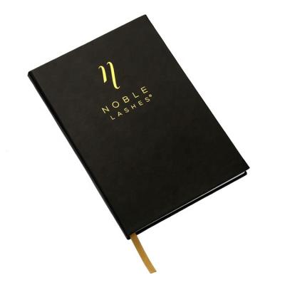 China Custom hardcover book A5 paper notebook with gold logo 80 gram wooden paper diary 2022 for sale