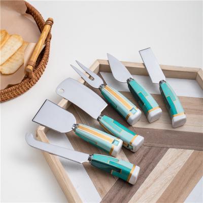 China Sustainable 6PCS Kitchen Tools Stainless Steel Cheese Slicer Collection Cheese Spreader Knife Set With Ceramic Handle for sale