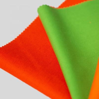 China ANSI/ISEA 107 Flame Retardant Permanent Fluorescent Flame Retardant Cotton Fabric for sale