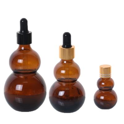 China 2022 New Arrival Cosmetic Oil Bottles 5ml 10ml 20ml 30ml 50ml 100ml 120ml Amber Glass Dropper Bottle Essential for sale