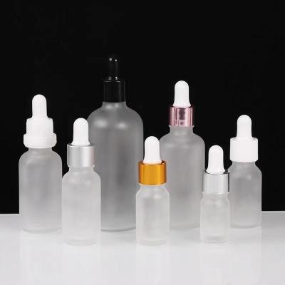 China Excellent Cosmetic Quality Customized Size White Dropper Bottle For Essential Oil Cosmetic Glass Bottle for sale