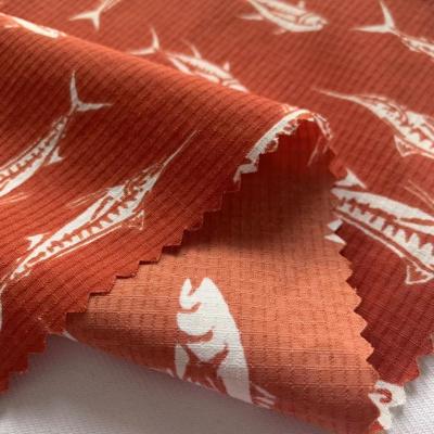 China Stretch Fish Pattern Printing 80D 103gsm Spandex Full Ripstop Fashionable Dress Fabric Water Resistant Stretch Matte Nylon Weft taslan for sale