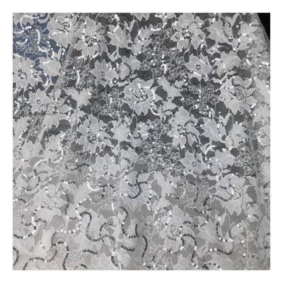 China Breathable Floral Lace Jacquard Fabric Wedding Dress White Tulle Lace Up Sequins Fabric For Bridal Dress for sale