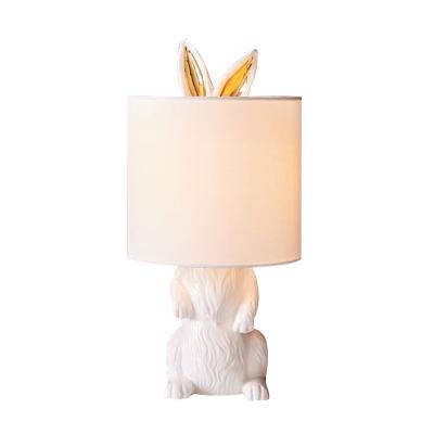 China Modern Simple Industrial Retro Bedroom Bedside Lamp Rabbit Resin Table Lamp With Fabric for sale