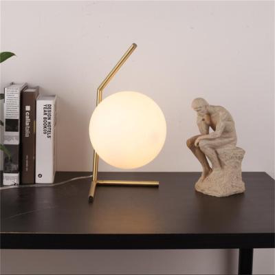 China Mid Century Design Antique Moon Decorative Glass Metal Table Bronze Lamp For Bedroom for sale