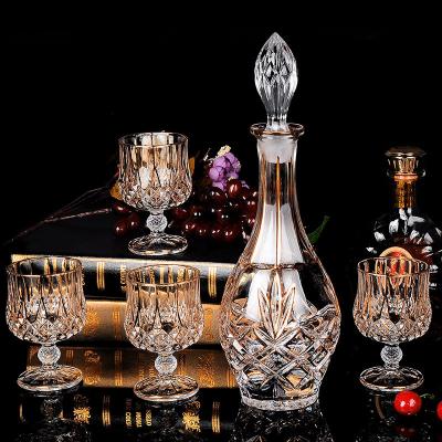 China Transitional Luxury Crystal Wine Decanter And Glass 7 Piece Tumbler Set Home Whiskey Brandy Cup Golden Wine Bottle Glasses for sale