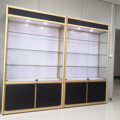 China Modern Gold Jewelry Shop Counter Design Stainless Steel Glass Jewelry Display Furniture Jewelry Display Rack Table for sale